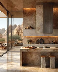 a large kitchen with an island counter and stools in front of the window that overlooks mountains