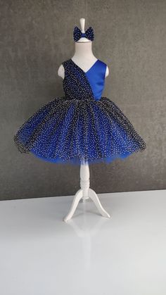 If you are looking for an elegant dress, our Royal blue and black polka-dot dress is very stylish and unique. Our dress, which is completely sewn with high quality satin and silvery polka dot tulle, is quite fluffy. This dress is handmade and we use high quality material and fabric for each dress. Your little princesses will dazzle with this dress. Perfect for birthdays, photo shoots or parties. We produce custom dresses for kids for any event, whether it's a birthday party, wedding baby bridesm Bridesmaids Colorful, Party Dress For Girls, Royal Blue Gown, Dress Pictures, Black Polka Dot Dress, Kids Gown, Girl Flower, Dresses For Girls, Blue Birthday