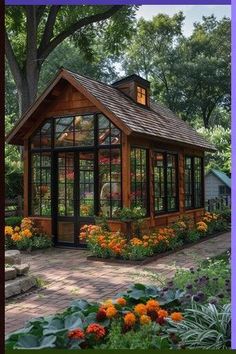 an image of a small house with flowers in the front and on the back side