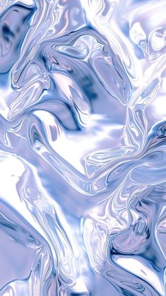 an abstract image of blue and white liquid or water with waves in the bottom right corner