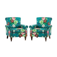 a pair of blue chairs with floral upholstered back and arms, both facing each other