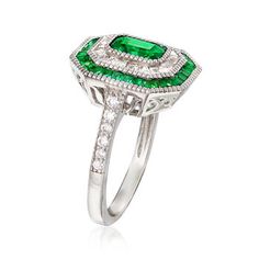 Ross-Simons - 2.00ct t. w. Simulated Emerald, .55ct t. w. Cubic Zirconia Ring in Silver. Size 10. A luxe look for less! Sparkling with 2.00 ct. t. w. simulated emeralds and .55 ct. t. w. CZ baguettes, this shimmering ring will have everyone fooled with its gorgeous gemstone lookalikes. Set in polished sterling silver. 5/8" wide. CZ and simulated emerald ring. Carat weights are diamond equivalents. Emerald birthstones are the perfect gift for May birthdays. Diamond Ring With Prong Setting For May Birthstone, May Birthstone Diamond Ring With Asscher Cut, Classic Diamond Ring With Vvs Clarity For May Birthstone, Gia Certified Cubic Zirconia Round Emerald Ring, Classic Halo Ring With Brilliant Cut For May Birthstone, Classic Diamond Halo Ring For May Birthstone, Diamond Asscher Cut Rings For May Birthstone, Cluster Rings With Pave Setting In Cubic Zirconia, Round Emerald Ring With Pave Diamond Setting