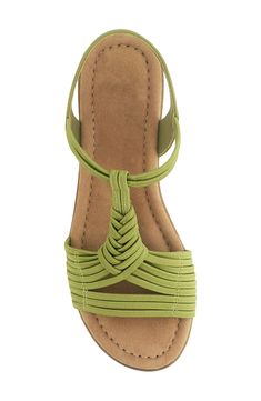 Intricately woven straps define the vamp of a versatile stretch-elastic sandal finished with a soft, cushioned footbed for all-day adventures. Textile and synthetic upper/synthetic lining and sole
 Imported Vacation T-strap Slingback Sandals In Synthetic, Vacation T-strap Slingback Sandals, Synthetic T-strap Slingback Sandals For Vacation, Comfortable Strappy Synthetic Sandals, Comfortable Adjustable Green Sandals, Adjustable Strappy Wedge Sandals For Vacation, Green Adjustable Strappy Sandals, Synthetic Strap Sandals For Vacation, Vacation Sandals With Synthetic Strap