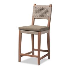 an upholstered wooden bar stool with a seat cushion on the back and arms