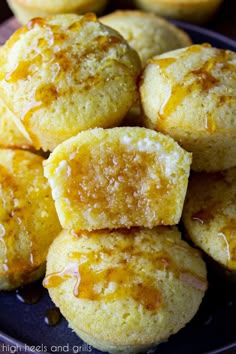 a blue plate topped with mini lemon muffins