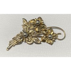 Vintage Sterling Silver Three Flower Brooch Pin Gold Wash Large 3.5 in. The brooch is in good condition. Stamped sterling on back measures 3.5 x 1 3/4 in. Weighs 17.5 grams Please check your pictures as they are part of the description and please ask questions prior to purchase. If I advertise a piece as gold or silver and it is unsigned or unmarked then it has been tested Finally, your feedback is important to us. If you were happy with our service, communication, shipping time, etc let us know Classic Flower Brooches For Anniversary, Formal Flower Shaped Hallmarked Brooch, Vintage Silver Flower Pins, Gold Wash, Flower Brooch, Vintage Sterling Silver, Brooch Pin, Brooches, Communication