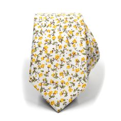 The floral marigold yellow tie rolled up Summer Wedding Cotton Ties, Spring White Cotton Suit And Tie Accessories, Spring Business Cotton Suit And Tie Accessories, White Cotton Ties For Gifts, Elegant Cotton Ties For Spring, Classic Cotton Ties As Gifts, Classic Cotton Ties For Gift, Cotton Standard Tie Perfect For Gifts, Classic Cotton Ties As Gift