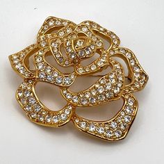 Elizabeth Taylor For Avon Pave Crystal Rose Brooch 1995 Pave Crystal Rose Collection Gold Plate Open Work Rose Pave Cz Roll Over Pin Closure 2.5" Diameter All Stones In Tact Original Box Included Susan Caplan Rediscovered Collection Selection Excellent Condition Rose Brooch, Avon Jewelry, Crystal Rose, Elizabeth Taylor, Brooches, Original Box, Gold Plate, Women Jewelry, Crystals