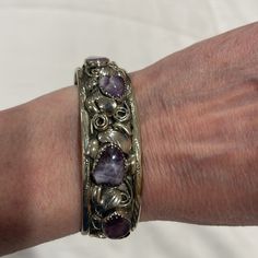 Vintage Sterling Silver Cuff Bracelet Purple Stones- Charoite? Marked With Artist’s Initials- Lt 2 Middle Stones Are Opaque And 2 End Stones Are More Transparent/See Through. See All Pictures Please. Beautiful Silver Work With 3d Swirls And Leaves! Fits Average Sized Wrist. Measured Appx. 5 5/8” End To End With 1 1/4” Gap Sterling Silver Cuff Bracelet, Silver Work, Purple Stones, Sterling Silver Cuff, Silver Cuff Bracelet, Silver Cuff, Vintage Sterling Silver, Cuff Bracelet, Gap