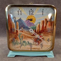 a clock with an image of a cowboy riding a horse in the desert on it