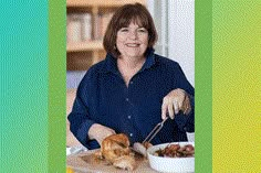 a woman is cutting up some food on a table