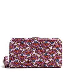 Combining sleek design with practical functionality, this wristlet keeps your phone and essentials within easy reach, ensuring you stay connected in style. Outlet Exclusive Interior features eight card slip pockets, a zip pocket and a phone pocket Snap closure. Dimensions: 6. 75" w x 3. 75" h Handle/Strap Wrist strap drop 6. 0" Vera Bradley Outlet Women's Phone Wristlet in Scaevola Fan Work Backpack, Fashion Umbrella, Phone Wristlet, Weekend Travel Bags, Medium Backpack, Belt Purse, Gifts Under 10, Flip Flop Slippers, Toiletry Bag Travel