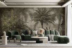 a living room with green couches and palm trees on the wall