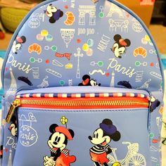 Super Awesome Danielle Nicole Disney Mickey And Minnie Mouse Great Backpack Design. Exclusive And Hard To Find. This Is A Fun Summertime Bag. It Has A Large Zipper Compartment And A Smaller Zipper Compartment On The Front With Adjustable Leather Straps. Great For Everyday Use. Fun Multicolor Backpack For Disney Trips, Fun Blue Backpack For Travel, Cute Blue Bags For Theme Park, Cute Blue Bag For Disney Fan Events, Blue Backpack For Disney Trips With Adjustable Strap, Blue Fun Backpack For Travel, Cute Blue Backpack For Theme Park, Blue Backpack With Adjustable Strap For Disney Trips, Blue Backpack With Zipper For Disney Trips