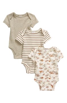 This three-pack of comfy cotton bodysuits is perfect for the baby with lots of unexpected outfit changes in their future. Pack of three assorted bodysuits Envelope neck; snaps between legs 100% cotton Machine wash, tumble dry Imported Dino Clothes, Woodland Baby Clothes, Top Baby Items, Baby Clothes Gender Neutral, Mini Jd, Infant Onesies, Baby Clothes Newborn, Gothic Baby