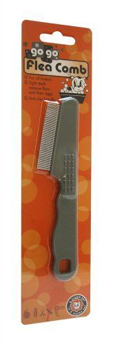 a black comb with an orange handle in a package on a white background for sale