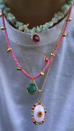 colorful beaded necklaces  • layering ideas  • colorful stone necklace  • beaded jewelry  • bright colors   • stacked jewelry ideas  • harry styles jewelry inspo  • necklace layers  • pink  • orange  • green  • pendant necklaces Stacked Beaded Necklaces, Victoria Paris Jewelry, Europe Jewelry, Colorful Jewelry, A Necklace