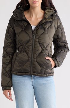 Stay warm in this water-resistant quilted puffer jacket featuring a cozy drawcord hood and secure zip pockets. 23 1/2" length (size Medium) Front zip closure Drawcord-toggle hood Adjustable snap cuffs Front zip pockets Nylon lining, with recycled polyester fill 100% nylon Dry clean or machine wash, tumble dry Imported Hooded Puffer Jacket, Quilted Puffer Jacket, Puffer Jacket, Stay Warm, Nordstrom Rack, Blazer Jacket, Zip Pockets, Puffer, Water Resistant