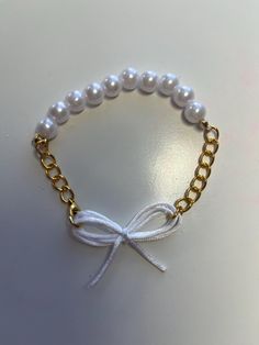 White, Gold, and Pearl Coquette Bow Bracelet Pearl Coquette, Bow Bracelet, York Pa, Coquette Bow, White Bow, Beauty Book, Jewelry Bracelets, Birthday Gifts, Beaded Bracelets