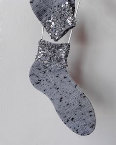 Step into warmth and style with our luxurious hand-knit wool socks, designed to keep your feet cozy while adding a touch of sparkle to your everyday look. Made from soft, breathable wool, these socks are perfect for chilly days or lounging around the house. The delicate sequin embellishments on the ribbing offer a subtle shimmer, making these socks a unique and fashionable accessory. Not only are they ideal for keeping you warm, but they also fit perfectly into boots or loafers, adding both comfort and style to any outfit.  SIZE:  US 6, EU 37, UK 4 (23.5cm) Key Features: Premium Wool: Soft, natural fibers that keep your feet warm and comfortable. Hand-Knit with Love: Each pair is meticulously crafted by hand for quality and care. Sequin Embellishments: A touch of sparkle on the ribbing for Socks For Loafers, Sequin Socks, Knit Wool Socks, Trendy Socks, Socks Christmas, Hand Knit Socks, Handmade Knit, Wool Socks, Christmas Socks