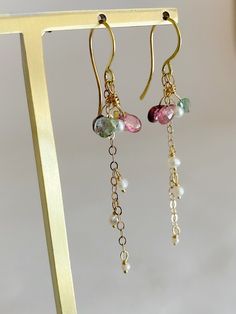 Watermelon Tourmaline, 18k Gold & Pearl. Approx. 1.5” in length. Feminine, delicate, weightless! Yellow Gold Tourmaline Dangle Jewelry, Yellow Gold Tourmaline Dangle Earrings, Gold Tourmaline Dangle Jewelry, Elegant Tourmaline Birthstone Jewelry, Elegant Dangle Tourmaline Jewelry, Diy Earrings Easy, Delicate Jewellery, Jewellery Sketches, Earring Ideas