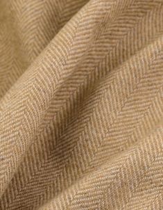 ITALIAN DESIGNER WOOL TWEED FABRIC BY HALF YARD This beautiful wool fabric, made in Italy, comes from a high-end designer deadstock and is distinguished by its luxurious feel, excellent quality, and timeless herringbone pattern in soft beige tones. This exclusive wool tweed stands out for its origin and quality. Not only is it warm and soft, but also breathable, durable, and comfortable to wear. Ideal material for high-quality sewing projects such as blazers, jackets, pants, warm dresses and lig Cream Wool Tweed Jacket For Fall, Beige Wool Tweed Jacket For Tailoring, Classic Cream Wool Tweed Jacket, Luxury Herringbone Pattern Suit, Long Sleeve Herringbone Tweed Jacket, Semi-formal Wool Tweed Jacket With Herringbone Pattern, Vintage Wool Outerwear With Herringbone Pattern, Wool Double-breasted Outerwear With Herringbone Pattern, Wool Double-breasted Herringbone Outerwear