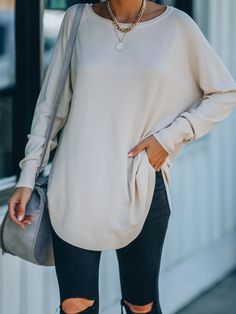 Our down sweater is oversized collared down Knit top in light beige tone is detailed with front short and long back design! Size Guide: Model is 5’6” tall, and has a 33.5” bust, 24.8”waist, & 37.4” hips. She is wearing a S / US 4 / AU 8. This knit top is true to size. Material: 65% viscose, 35% polyamide. Key Features: Relaxed fit. Oversized collar. Relax fit. Maternity friendly. Care Instructions: Machine wash / Cold hand wash Oversized Taupe Sweater For Layering, Oversized Knit Top In Neutral Color, Oversized Neutral Knit Top, Neutral Oversized Knit Top, Cream Solid Color Top For Fall, Oversized Long Sleeve Neutral Top, Oversized Beige Tops For Fall, Oversized Long Sleeve Beige Sweater, Oversized Beige Long Sleeve Sweater