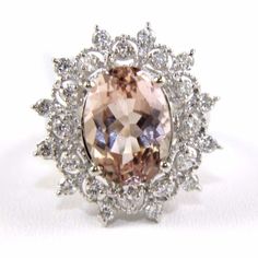 This Is A Fancy Fine Huge Oval Cut Morganite Cocktail Ring W/Diamond Spiderweb Halo. It Is Made Of 100% Natural 14kt White Gold And Is In Brand New Condition. It Has A Ctw Of 7.8ct And Weighs 7.8 Grams. The Fancy Diamonds Have A Clarity Of Si2 And G Color. This Beautiful Custom Piece Has An Excellent Oval Cut Morganite Stone, Surrounded By A Diamond Spiderweb Style Halo. This Ring Is The Latest In Fashion Design Having Unique Designer Qualities That Is Full Of Shine And Clarity. It Comes With A Formal Morganite Diamond Ring With Brilliant Cut, Classic Morganite Diamond Ring For Formal Occasions, Formal Morganite Diamond Ring In Fine Jewelry Style, Formal Morganite Diamond Ring Fine Jewelry, Formal Morganite Diamond Ring, Formal Morganite Diamond Ring With Center Stone, Exquisite Morganite Diamond Ring For Anniversary, Heirloom Morganite Diamond Ring For Formal Occasions, Elegant White Gold Morganite Wedding Ring