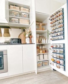 an open pantry with lots of food in it