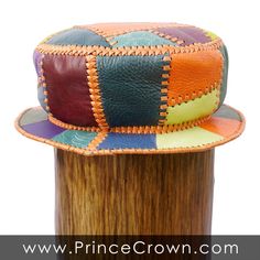 Height: MEDIUM Circumference 60 cm or 23.5 inches This colourful leather bucket hat is made from bright designer leather and popping hand cut orange leather lace. Only one of each leather hat is made. Rasta Bucket Hat Designer Top Hat LL Cool J Hat Check out our other items here: https://www.PrinceCrown.com Handmade Leather Brimmed Hat, Artisan Leather Brimmed Hats, Handmade Leather Hat With Flat Brim, Handmade Artisan Leather Hat, Artisan Handmade Leather Hat, Leather Bucket Hat, Leather Top Hat, Cut Orange, Ll Cool J