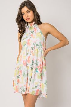 Floral print halter dress Printed Knee-length Mini Dress For Day Out, Knee-length Printed Mini Dress For Day Out, Spring Halter Neck Sundress For Brunch, Multicolor Printed Sleeveless Dress For Spring, Spring Multicolor Printed Sleeveless Dress, Flowy Spring Maxi Dress With Halter Neck, Spring Flowy Halter Neck Maxi Dress, Summer Mini Dress With Halter Neck For Spring, Chic Sleeveless Sundress With Elastic Neckline