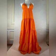 Fashion Nova Maxi Dress. It Is A Long Dress With A Deep V-Neck, Ruched, Top Lined, And Stretches With Adjustable Straps. Condition: New Color: Orange Size: Medium Orange V-neck Summer Maxi Dress, Lined V-neck Summer Maxi Dress, Summer V-neck Lined Maxi Dress, Orange Lined V-neck Dress, Orange V-neck Lined Dress, Orange V-neck Maxi Dress For The Beach, Orange Tiered Maxi Dress For Beach, Orange Tiered Beach Dress, Summer Orange V-neck Maxi Dress