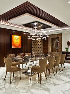 an elegant dining room with marble floors and walls