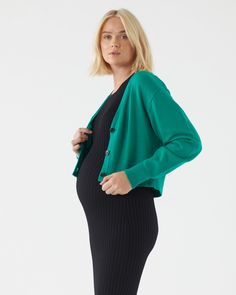 Nursing friendly Button closure front Cropped length Total length: 47cm(size S) A classic knit that you will wear now and forever, the V Neck Cropped Cardigan is the perfect addition to any outfit! Designed in a beautiful beige marle and bright green, the knit is soft and also has just the right amount of stretch. Wear it open with a classic tee and jeans for a cool casual look, or team it over one of our bump hugging dresses. PLEASE NOTE: Soon Maternity sizing is generous to ensure it lasts the Versatile Winter Cardigan With Buttons, Versatile Everyday Cardigan With Button Closure, Spring Fine Knit Button-up Outerwear, Chic Cardigan With Button Closure For Layering, Chic Solid Cardigan With Button Closure, Chic Cardigan With Button Closure, Fitted Soft Knit Cardigan For Everyday, Chic Button-up Cardigan For Layering, Fitted Everyday Cardigan