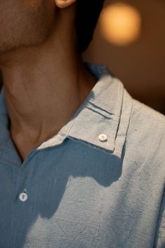 100% Organic Cotton • Hand Spun • Hand Woven • Natural Dyed • Embroidery DetailCrafted in 100% cotton fibres and natural materials, this Embroidered Cuff Detail Shirt has been naturally dyed using Indigo and Turmeric.Replete with slits in the front, pintucked double collar & embroidered cuffs make this shirt a versatile button-up for an all-season wardrobe. This breathable cotton shirt features stitches of Kantha, running in shades of blue & off-white creating an ombré transition at the cuffs.Type of Button used: Mother of Pearl Buttons Shirt Detailing Men's, Menswear Shirt Details, Interesting Mens Fashion, Types Of Cuffs, Mens Shirt Details, Embroidery Shirt Men, Shirt Detailing, Boys Dresses, Embroidered Cuffs