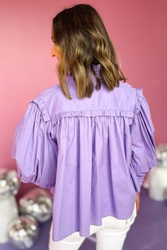 You'll be inspired every time you wear the Karlie Purple Poplin Tie Neck Ruffle Sleeve Top. Crafted from high-quality poplin fabric, this top features a tie neck, ruffled sleeves, and a fit that is both elegant and flattering. Pair this top with your go-to denim and booties for an effortless ensemble! 97% Cotton, 3% Spandex Model is 5’9, size 6 wearing a Small 4-6 Small 8-10 Medium 10-12 Large View the Size Chart Fall Tops With Ruffles And Balloon Sleeves, Fall Balloon Sleeve Tops With Ruffles, Spring Cotton Tops With Pleated Sleeves, Balloon Sleeve Tops With Ruffles For Day Out, Trendy Spring Blouse With Ruffled Collar, Trendy Ruffled Blouse For Brunch, Chic Collared Poplin Blouse, Trendy Cotton Tops With Smocked Cuffs, Summer Ruffle Top With Bishop Sleeves