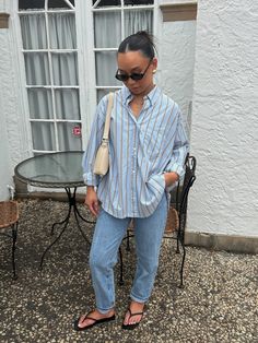 Our Remi button up is a 2 color vertical striped loose fit collared button up shirt. Choose to wear it as top or throw it on over your bathing suit for a quick cover up. *Also comes in sand* 100% Cotton model is 5'2 wearing a small Button Up Linen Shirt Outfit, Business Casual Button Up Women, In Between Summer And Fall Outfits, Button Down Shirt Jeans Outfit, Blue Button Down Shirt Outfit Summer, Stripped Button Down Shirt Outfit Summer, Blue Collared Shirt Outfit Women, White And Blue Button Up Shirt Outfit, Large Button Up Shirt Outfits