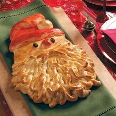 this is an image of a christmas dish made out of bacon and other food items