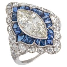 Art Deco over 2 carat Diamond Marquise Sapphire Platinum Ring. Marquise Diamond approx. 2.20 carat M P1, blue sapphire approx. 0.80 carat and diamonds pave 1.20 carat. Size: 56 / 7.75 US, Total weight: 6.55 grams. Marquise Sapphire, Diamond And Sapphire Ring, Ring Marquise, Marquise Ring, Art Deco Diamond, Marquise Diamond, Etsy Art, Platinum Ring, Gem Stone