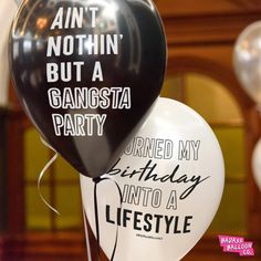 two balloons that say, ain't nothing but a gangster party turned my birthday into a lifestyle