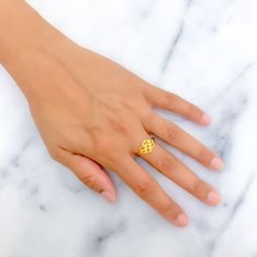 This 22k gold ring features a modish fancy design, perfect for adding elegance to any outfit. Weighing 2.0 grams, it showcases a yellow gold finish that enhances its stylish and modern appearance. Sized at 7.25, with resizing available, this ring combines style and practicality, making it ideal for daily wear or special occasions. Suitable for those who appreciate fashionable and refined jewelry, this ring brings a touch of luxury and fancy charm to your collection. PRODUCT DETAILS Gold Purity(karat): 22k Gold Weight(grams): 2.0 Item Finish: Yellow Gold Ring Size: 7.25 Ring Sizing Available: Yes 22k Gold Open Ring, 22k Gold Promise Ring, Yellow 22k Gold Rings, 22k Gold Toe Rings In Yellow Gold, 22k Yellow Gold Toe Rings, Yellow Gold 22k Toe Rings, 22k Gold Ring, Indian Rings, Bridal Jewelry Necklace