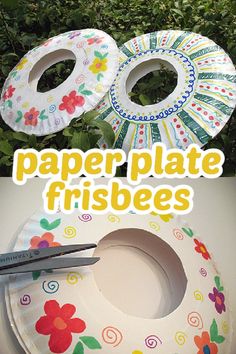 paper plate frisbees are sitting on top of a table with scissors next to them