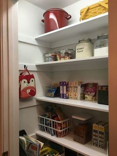 the pantry is stocked with various foods and condiments