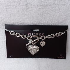 Necklace In Silver Tone, Chain Clink Style With Two Hearts In Clear Rhinestones,With A Slip In Closure By Guess. Listed On Card 18 Inch. New Without Tags, Did Not Removed From Card For Pictures. # Ad-16 2000s Stuff, Digital Wardrobe, Guess Jewelry, Unique Silver Jewelry, Silver Jewelry Necklace, Dope Jewelry, Pretty Jewelry, Two Hearts, I Love Jewelry