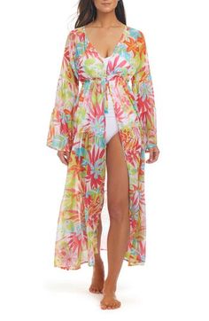 Move from beach to cocktails in this enchanting chiffon cover-up designed with a fluttery silhouette that's covered in vibrant flowers and tropical fronds. Front tie closure Plunge neck Long sleeves Sheer 100% polyester Hand wash, line dry Imported V-neck Chiffon Beach Cover-up, Multicolor Flowy Cover-up For Beach Party, Bohemian Chiffon Beach Dress For Beach Season, Flowy Multicolor Beachwear Cover-up, Summer Chiffon Cover-up, Spring Beach Dress In Chiffon, Chiffon Cover-up For Vacation, Flowy Chiffon Beach Dress Cover-up, Bohemian Chiffon Beach Cover-up