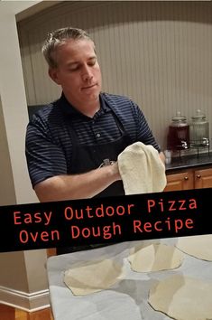 a man is making homemade pizza dough in the kitchen