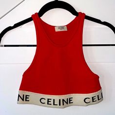 Brand New, Never Been Worn, Only Tried On So Perfect Condition. Bright Red Branded Crop Top. Purchased From The Webster And Never Ended Up Wearing. Designer Red Tops For Summer, Sporty Fitted Red Crop Top, Sporty Red Fitted Crop Top, Sporty Red Crop Top, Red Fitted Sporty Crop Top, Red Sporty Crop Top, Red Cropped Fitted Tank Top, Luxury Red Tank Top, Celine Crop Top