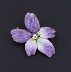 During Victorian and Edwardian times the gift of violets suggested that the giver's thoughts were occupied with love.   A perfect love token, this 14k gold and purple enamel brooch/pendant features a glistening diamond accent at its center. The piece measures 1.4 inches from top to bottom by 1 inch wide, and it is in excellent condition.  We have many other fantastic offerings of period fine jewelry posted on our Etsy store, so please consider browsing our other items. We send all items in indiv Small Edwardian Purple Brooch, Lavender Brooch Jewelry As A Gift, Elegant Flower Enamel Pin Collectible, Hallmarked Enamel Brooches As Gifts, Hallmarked Enamel Brooches For Gifts, Gift Enamel Brooches Hallmarked, Yellow Gold Enamel Brooches For Gifts, Purple Brooch Jewelry Gift, Antique Purple Brooches As Gift