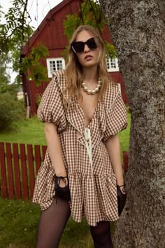 When packing for your holiday weekend, don't leave without the Gingerbread Gingham brown mini dress—a gingham mini dress cut to an A-line silhouette, featuring a large ruffled collar, puff sleeves, and a full skirt. This short dress is adorned with lace trims at the collar and a functional grosgrain ribbon at the center-front. Floral Dress Winter, Gingham Mini Dress, Brown Mini Dress, Knit Sweaters, Ruffled Collar, Lace Trims, Wedding Lingerie, Don't Leave, Winter Clothing