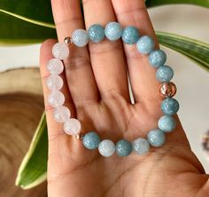 *If you are ordering a bracelet, measure your wrist and add 1/2 inch for a perfect/snug fit or 1 inch if you like a little more space.     Using all 8mm and 4mm beads and high quality gemstones, this beautiful Mala is made with Aqua Jade, White Jade, and rose gold plated hematite gemstones.  Strung on strong, stretchy cord and designed by me! White Jade: provides compassion and forgiveness. It is known to bring our relationships and environment into balance with us. Aqua Jade: It provides peace Spiritual Jade Stretch Bracelet With 8mm Beads, Blue Beaded Jade Bracelets, Spiritual Blue Jade Bracelets, Hand-strung White Jade Beaded Bracelets, Blue Aquamarine Beaded Bracelets, Spiritual Style, White Jade, Healing Bracelets, Gemstone Healing, Gemstone Bracelets